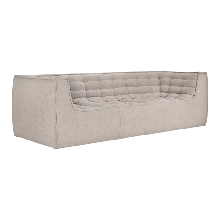 Beige upholstered sofa with a modern quilted pattern and minimalist design.