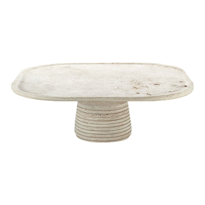 Rectangular cream-colored serving platter with a textured striped pedestal base. Elegant and minimalistic design.