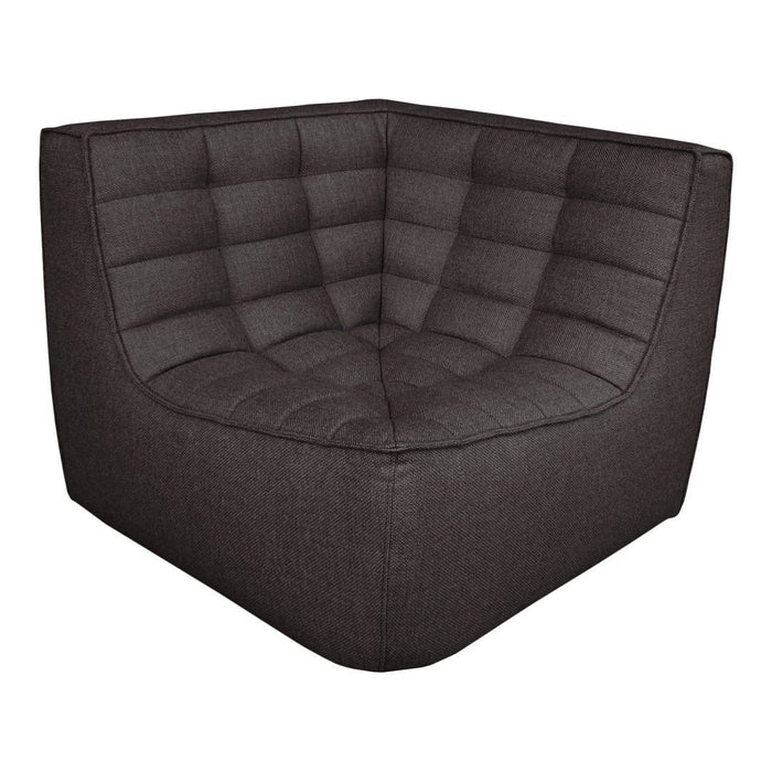 Dark gray upholstered corner chair with a quilted pattern for added comfort and style. Perfect for modern interiors.