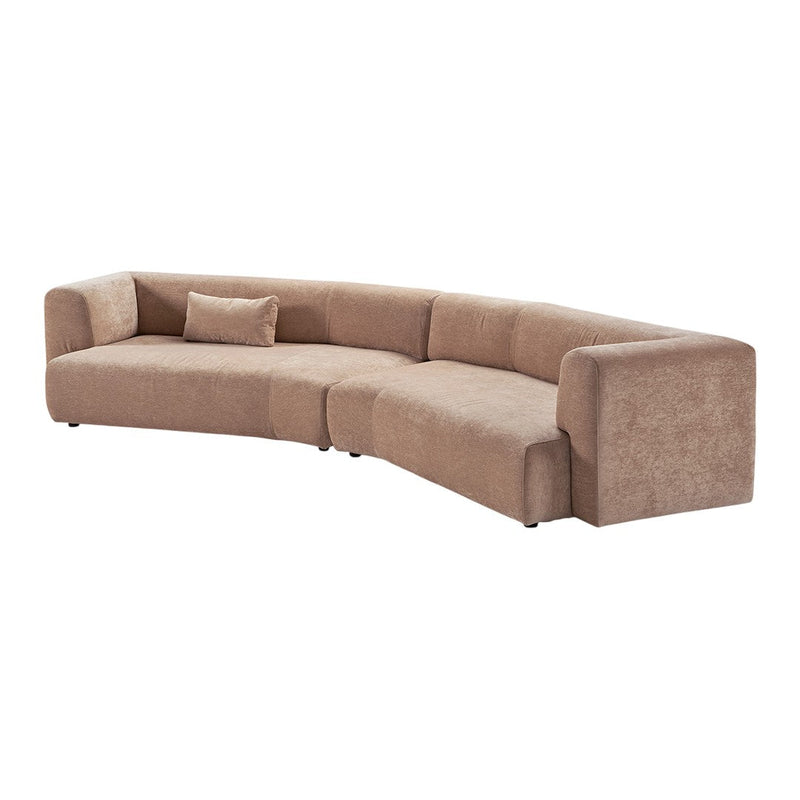 Curved beige sofa with soft, textured fabric and a matching pillow, perfect for modern living spaces.