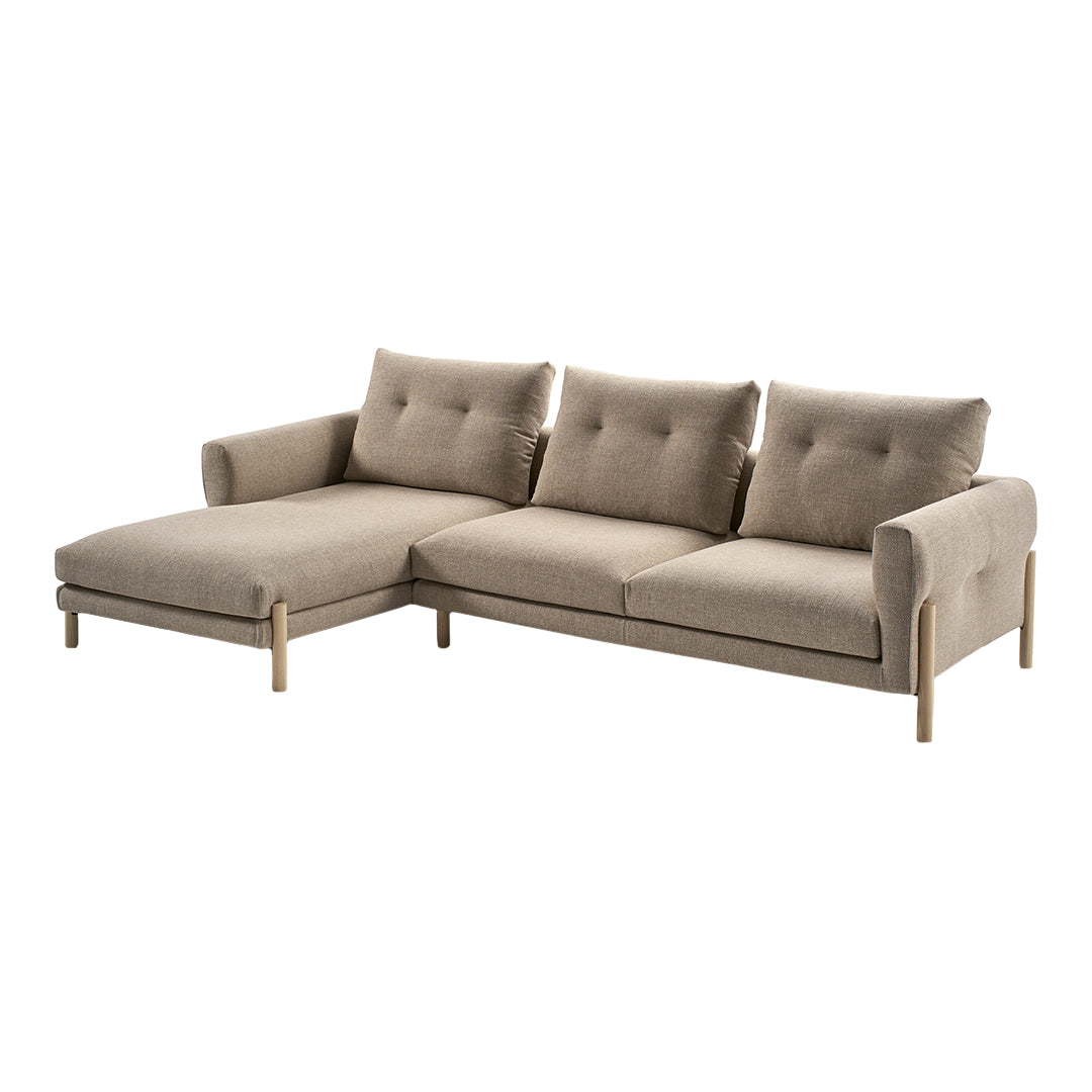 Beige sectional sofa with tufted cushions and a minimalist design, perfect for modern living spaces.