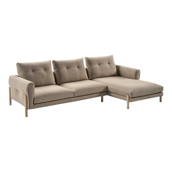 Beige fabric sectional sofa with tufted cushions and light wooden legs, featuring a smooth, minimalist design.