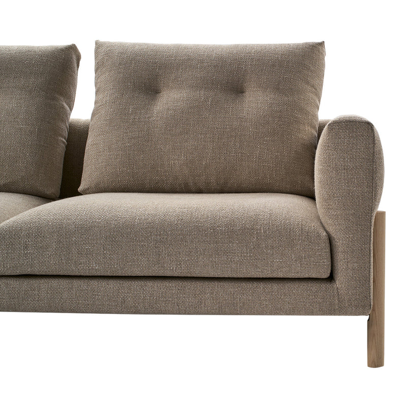 Light gray fabric sofa with a textured pattern and wooden armrest. Ideal for modern interiors.