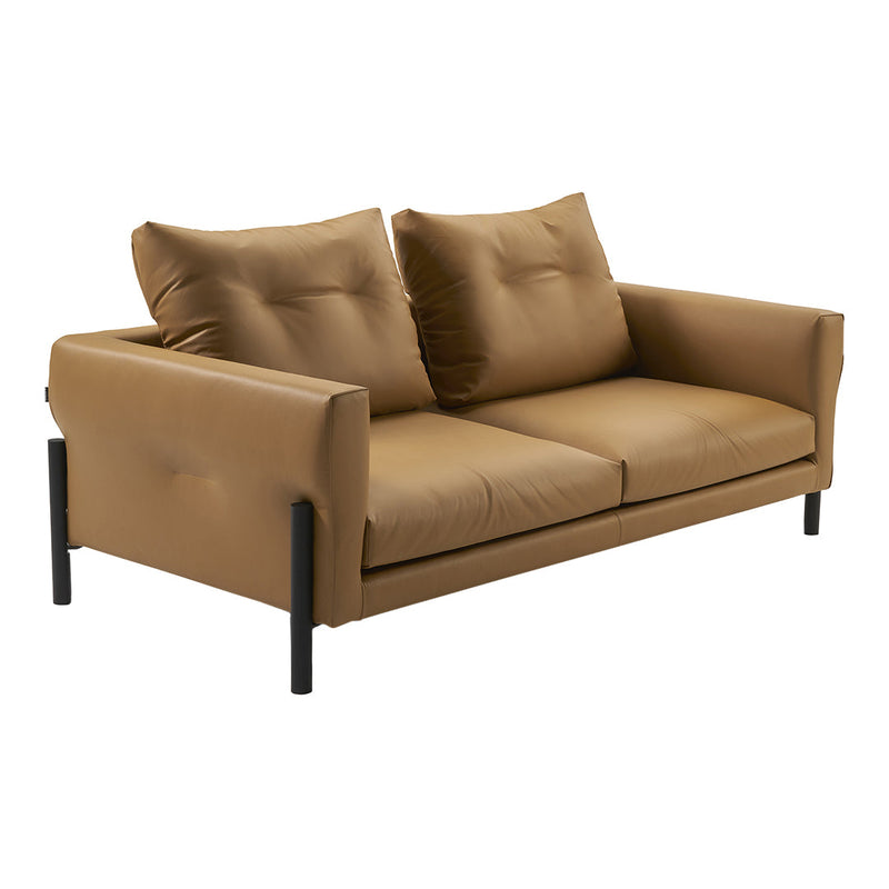 Tan upholstered sofa with button-tufted cushions and sleek black metal legs, perfect for modern living spaces.