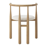 Wooden chair with a white cushion on a white background