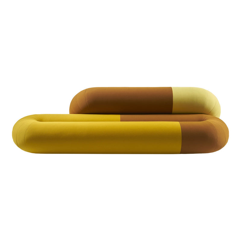 Two abstract cushions in earthy tones of yellow, brown, and cream with smooth, rounded shapes and unique patterns.