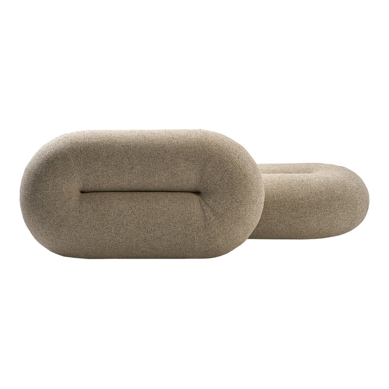 Textured light brown oval pillows with a minimalist design, perfect for modern decor.
