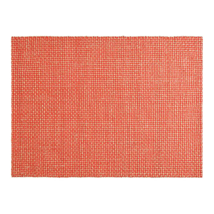 Textured coral placemat with a woven pattern, featuring a vibrant orange-red hue and subtle beige highlights.