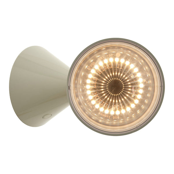 Circular LED wall lamp with a sleek white finish and intricate golden light pattern. Perfect for modern decor.