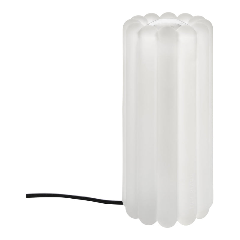 White sculptural lamp with a ribbed texture and black cord, adding a modern touch to any decor.
