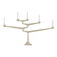 Modern beige candle holder with sleek, minimalist design and multiple arms for a stylish table centerpiece.