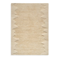 Beige textured rug with a zigzag pattern along the edges, adding depth and style to any space.
