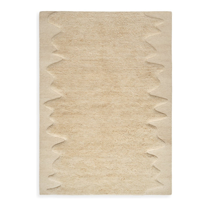Beige textured rug with a zigzag pattern along the edges, adding depth and style to any space.