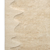 Beige textured surface with subtle wave patterns, perfect for adding warmth and elegance to any space.