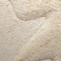 Beige textured fabric with soft, subtle patterns in varying shades of cream. Ideal for a cozy, neutral decor.