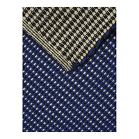 Navy and cream woven fabric featuring a checkered pattern with contrasting textures. Ideal for stylish decor or fashion.