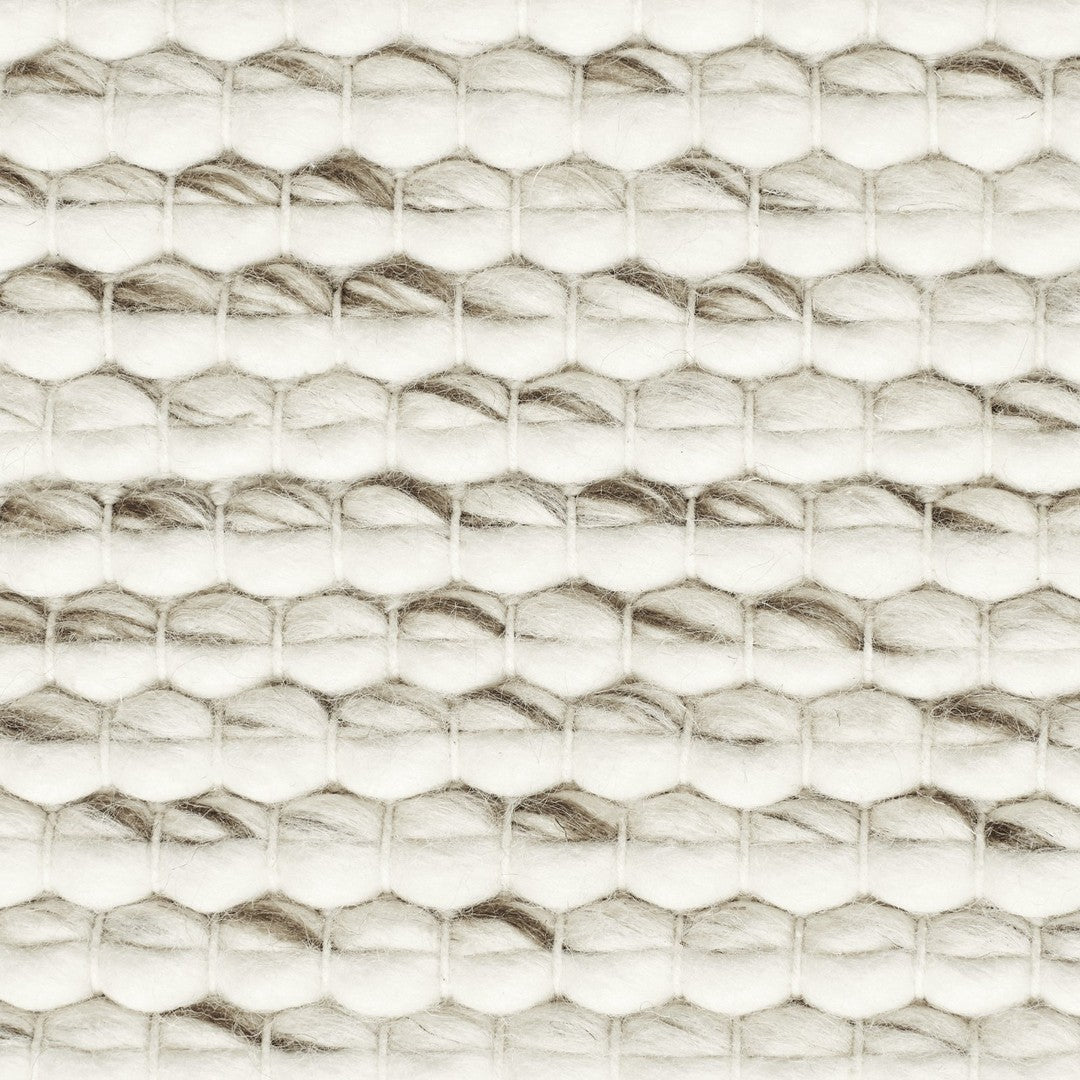 "Textured pattern with light beige and metallic gold hexagonal shapes, creating a modern and elegant design."