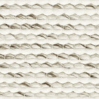"Textured pattern with light beige and metallic gold hexagonal shapes, creating a modern and elegant design."