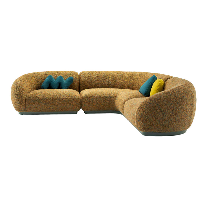 Curved sofa in warm orange fabric with vibrant teal and yellow accent pillows, featuring a textured pattern.
