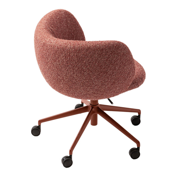 Curved pink chair with a textured fabric and sleek brown metal base, featuring rolling wheels for easy mobility.