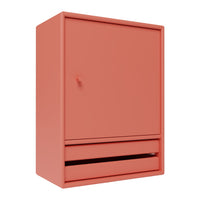 Coral-colored cabinet with a smooth matte finish and minimalistic design, featuring a single drawer and door.