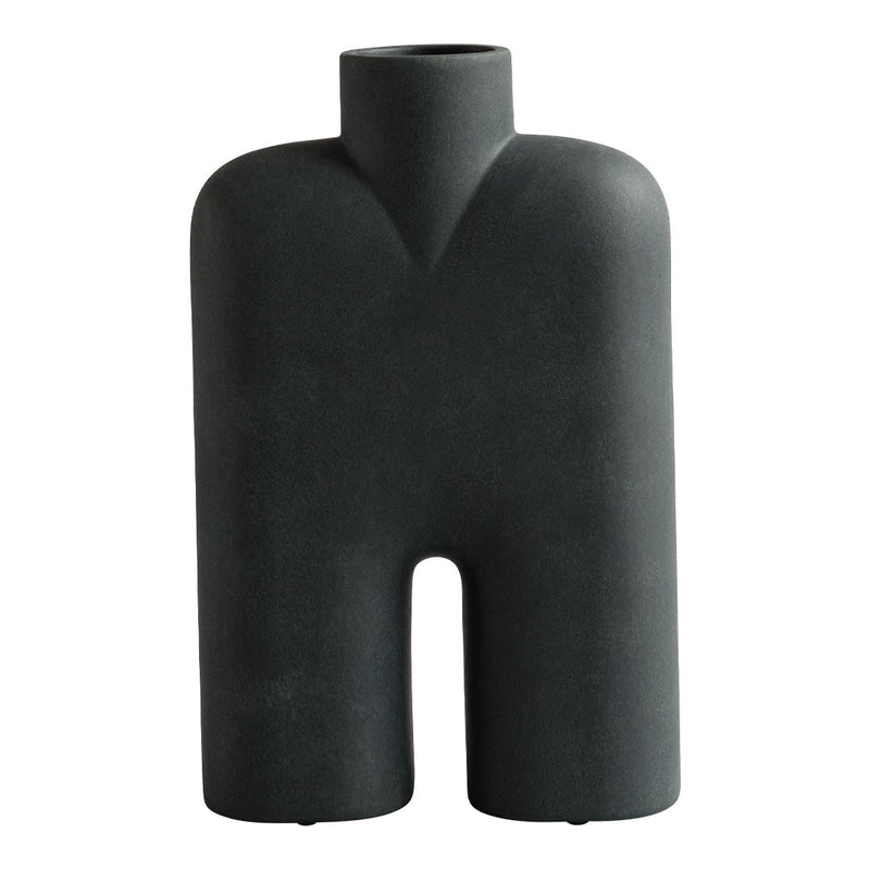 Black matte abstract vase with a unique human-like shape and smooth, modern finish. Perfect for minimalist decor.