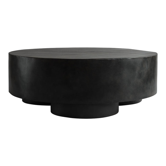 Round black coffee table with a smooth matte finish and minimalist design, featuring subtle textural variations.