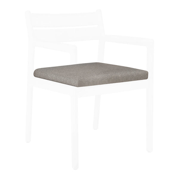 Gray textured cushion on a minimalist white-framed armchair, perfectly blending modern design with subtle elegance.