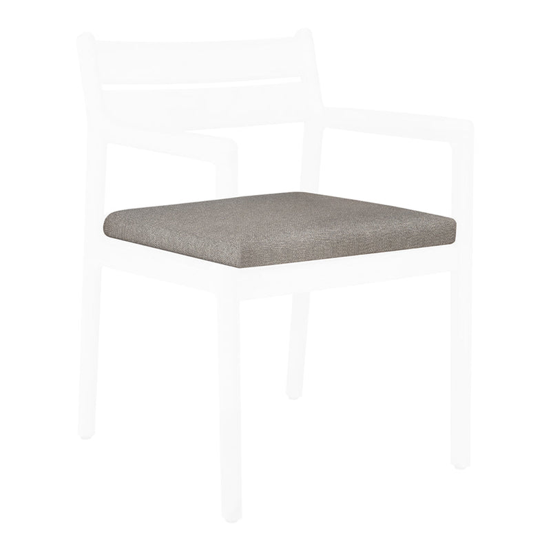 Gray textured cushion on a minimalist white-framed armchair, perfectly blending modern design with subtle elegance.