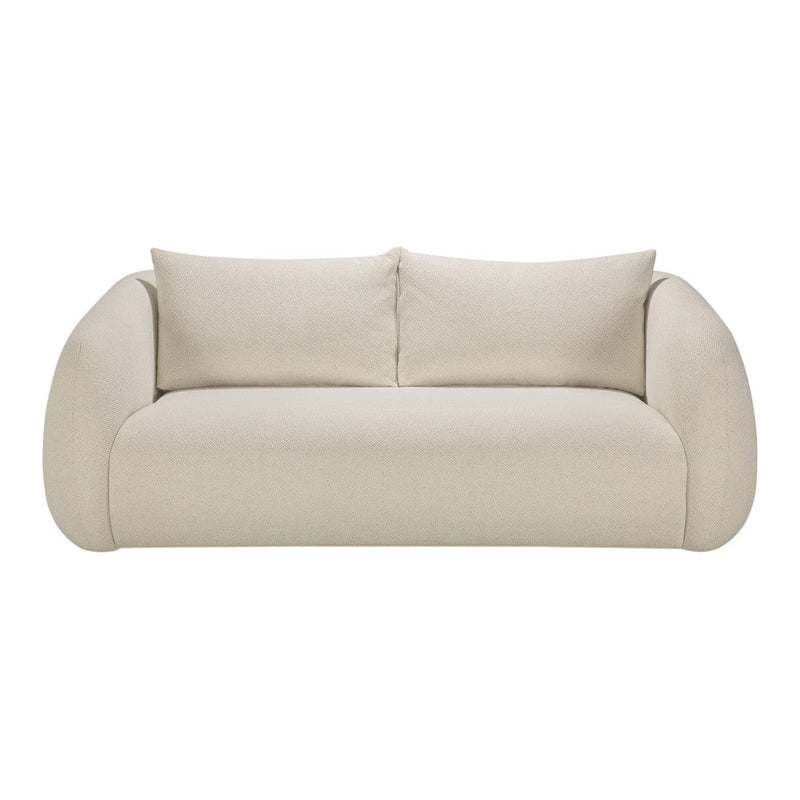 Beige sofa with rounded arms and plush cushions, featuring a smooth, textured fabric finish. Perfect for modern decor.