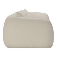 Beige plush textured sofa with smooth, minimalist design and curvy edges. Perfect for modern home decor.