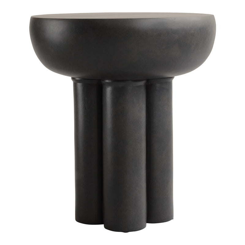 "Matte black pedestal table with a smooth rounded top and four cylindrical legs."