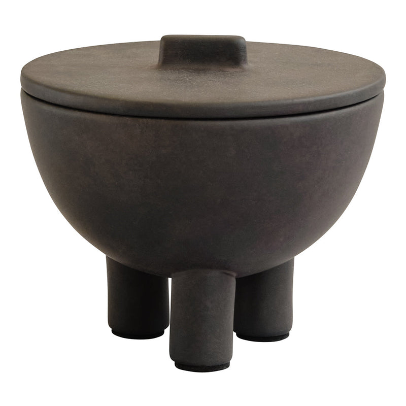 Black ceramic bowl with lid and three short legs, featuring a matte finish and smooth, rounded design.