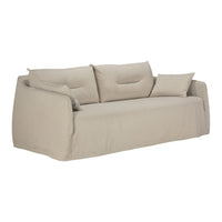 Beige sofa with soft texture and simple, clean lines, featuring three plush cushions for added comfort.