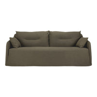 Olive green sofa with a smooth texture and minimalistic design, featuring plush cushions and an inviting look.