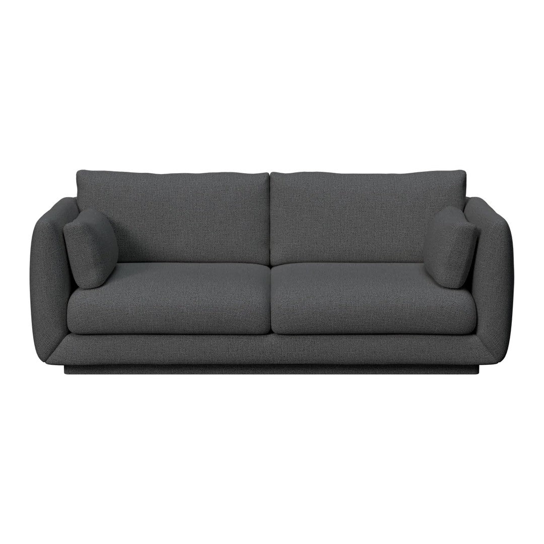 Modern gray sofa with a sleek design, featuring smooth fabric and plush cushions for a comfortable look.