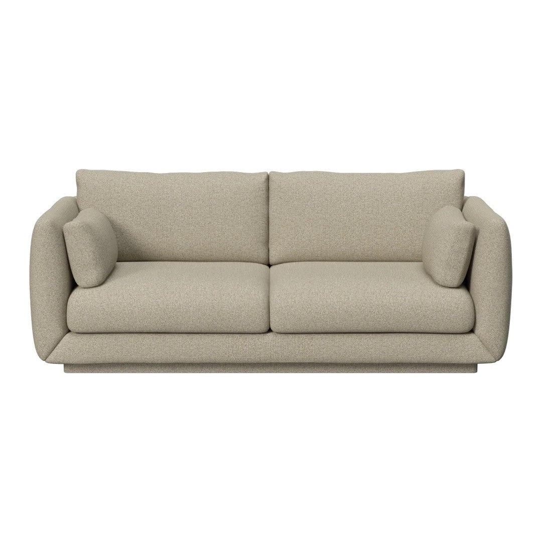 Beige upholstered sofa with a soft, textured pattern and oversized cushions, ideal for modern living spaces.