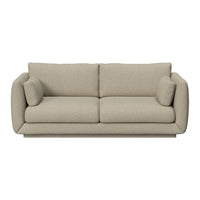 Beige upholstered sofa with a soft, textured pattern and oversized cushions, ideal for modern living spaces.