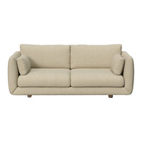 Beige fabric sofa with a smooth texture, featuring simple lines and rounded arms for a modern look.