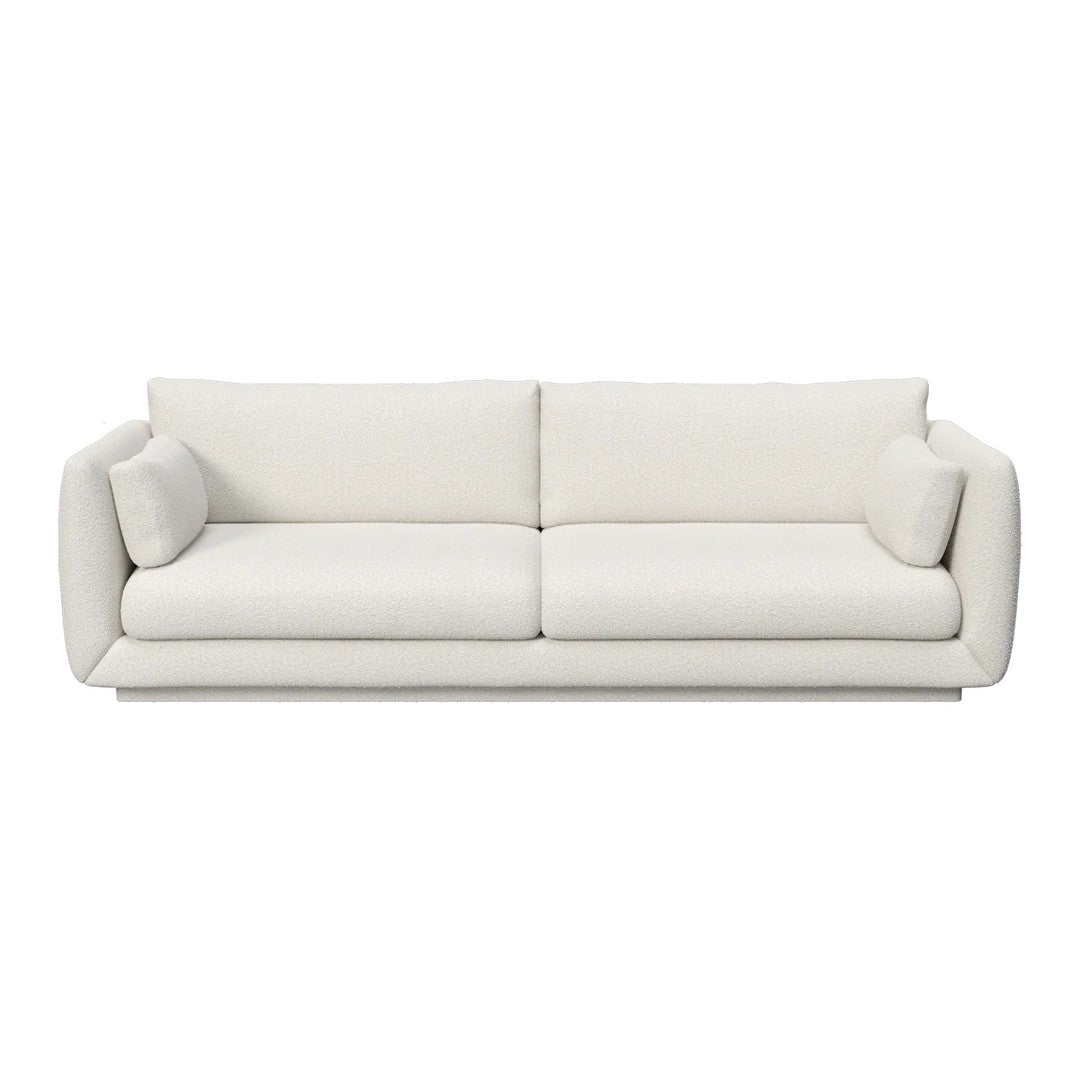 Modern, plush white sofa with smooth, minimalist design and rounded arms, ideal for contemporary interiors.
