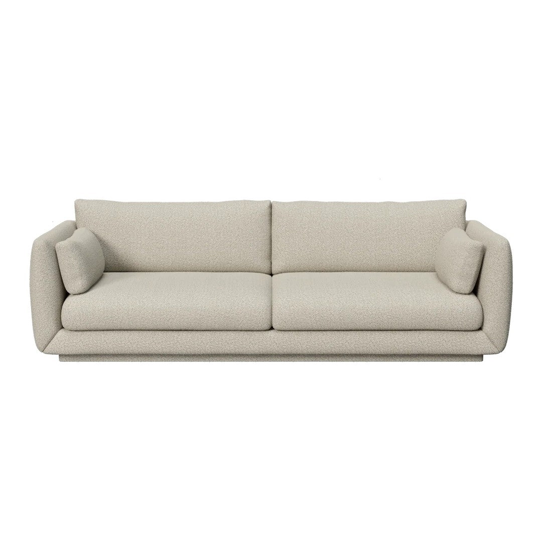 Light beige sofa with a smooth texture and minimalistic design. Ideal for modern, neutral decor.