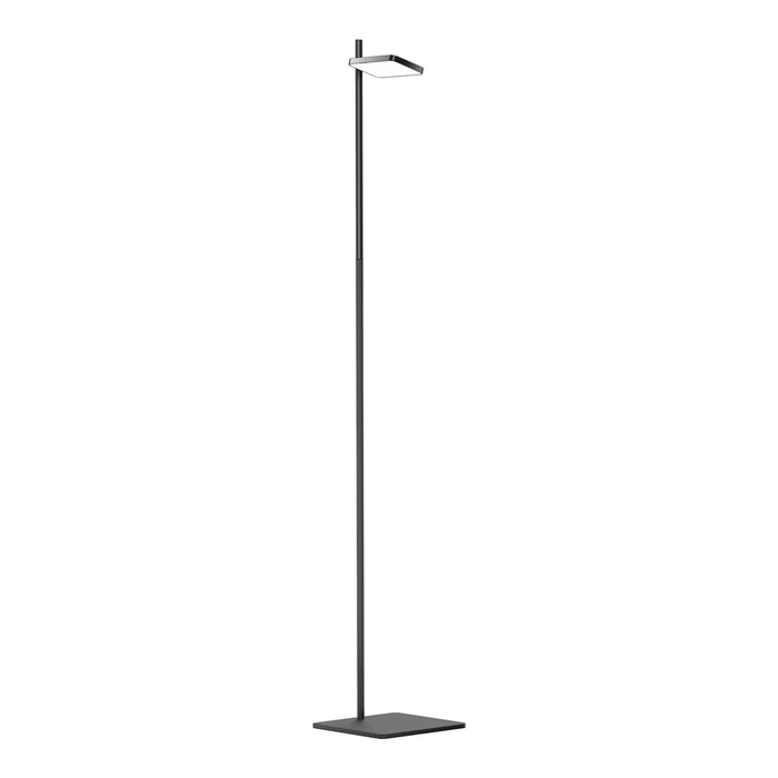 Sleek black floor lamp with minimalistic design and a modern white shade for contemporary decor.