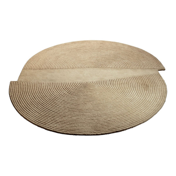 Beige circular rug with textured concentric patterns, featuring a stylish two-tone design.