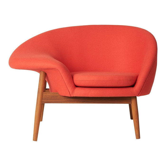 Vibrant coral-orange upholstered chair with a modern curved design and wooden legs, perfect for stylish interiors.