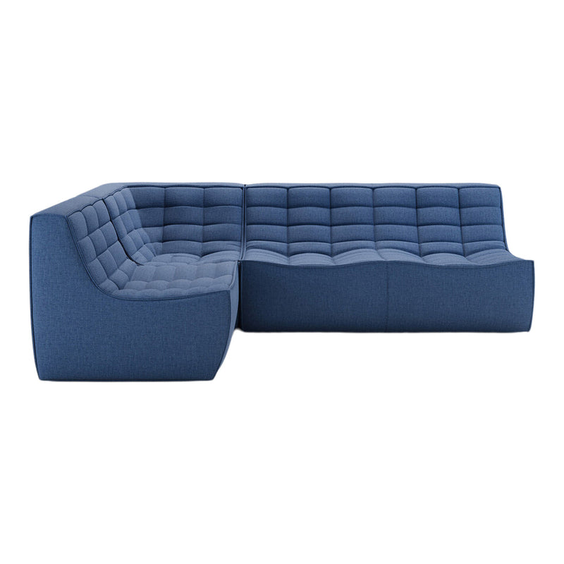 Blue upholstered sectional sofa with a tufted design and subtle texture pattern. Perfect for modern living spaces.