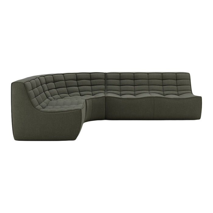 Curved sectional sofa in deep olive green fabric with tufted pattern and a contemporary design.