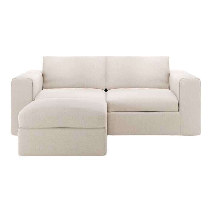 Beige modern sectional sofa with soft, textured fabric and minimalist design, perfect for contemporary decor.
