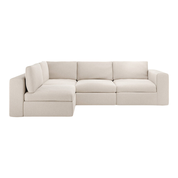 Light beige modular sectional sofa with a soft, textured fabric and clean lines, perfect for modern interiors.
