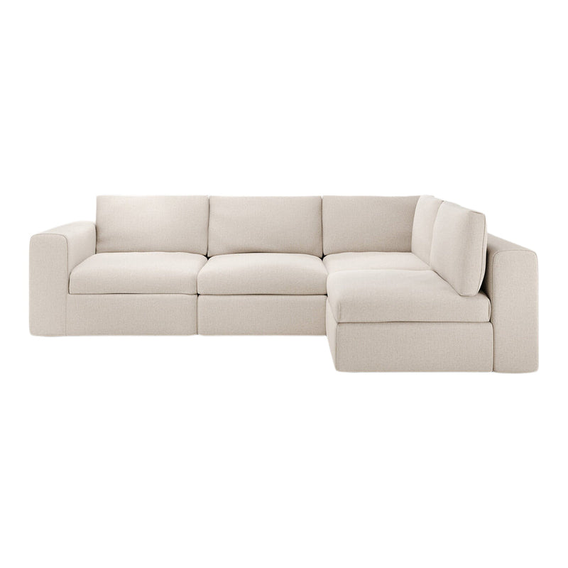 Light beige sectional sofa with a clean, minimalist design and soft texture, perfect for modern living spaces.