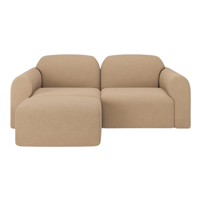 Beige modular sofa with a smooth, textured fabric and rounded edges, perfect for modern living spaces.